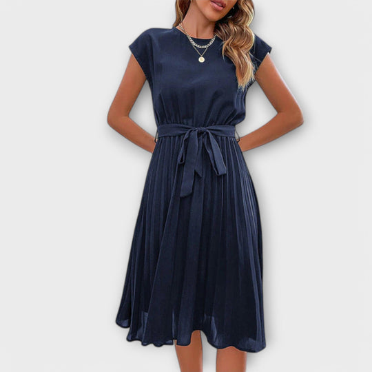Mireia – Pleated Dress with Waist Bow
