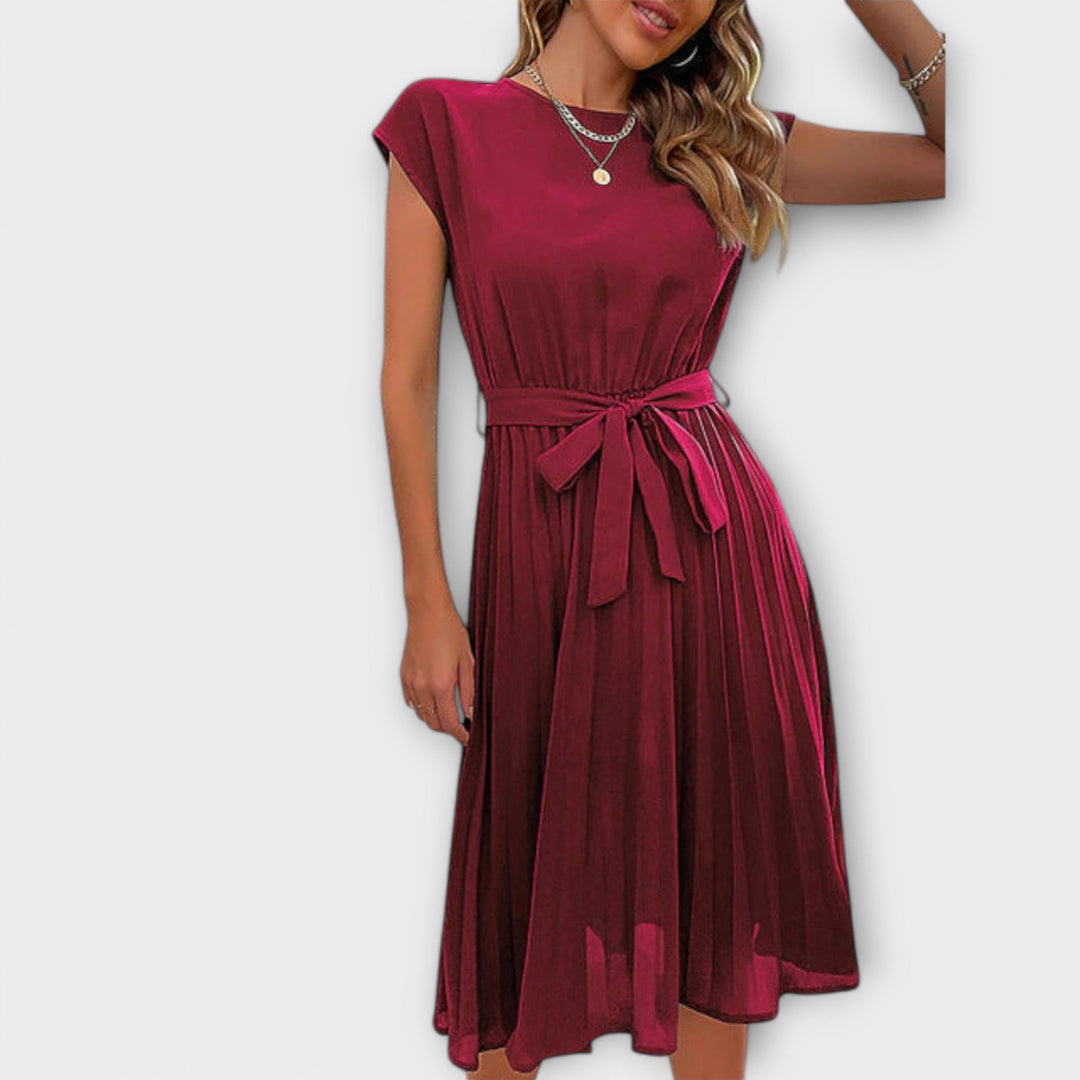 Mireia – Pleated Dress with Waist Bow