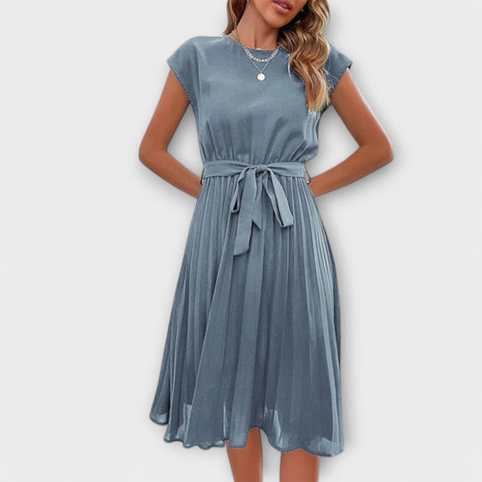 Mireia – Pleated Dress with Waist Bow