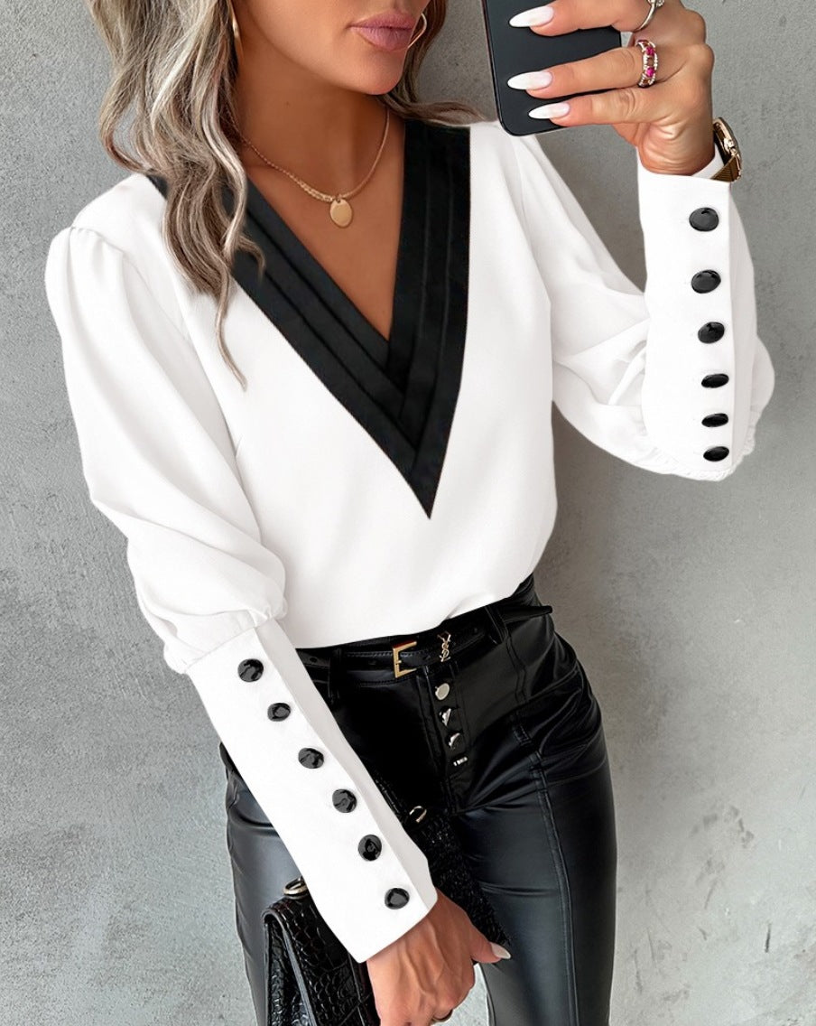 Zofia – Elegant V-neck blouse with decorative cuffs for women