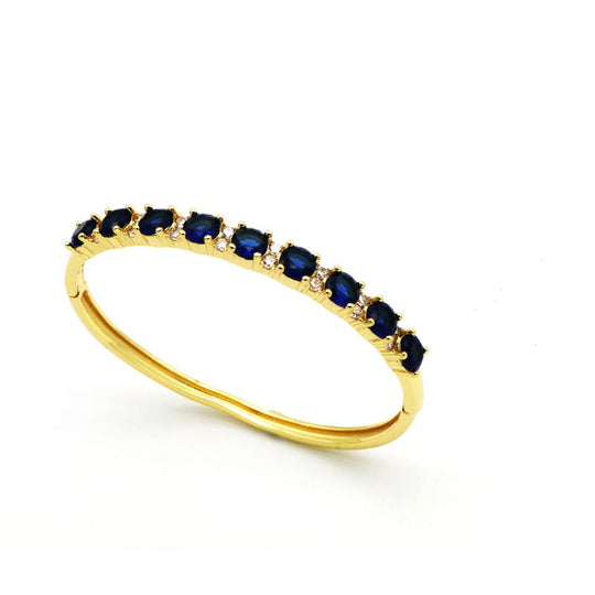 Bridget – Gold Ring with Blue Sapphire Accents