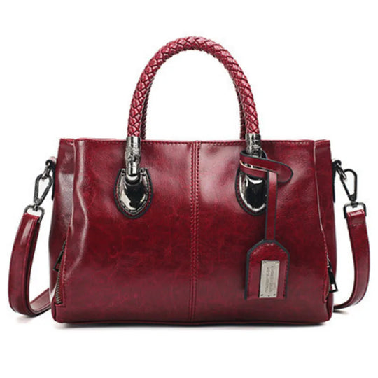 Amella – Sophisticated Leather Handbag Featuring Braided Handles