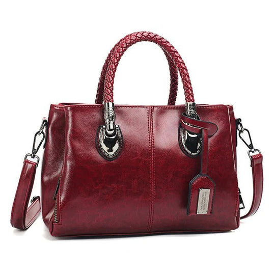 Amella – Sophisticated Leather Handbag Featuring Braided Handles
