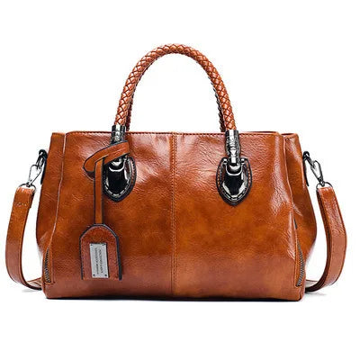 Amella – Sophisticated Leather Handbag Featuring Braided Handles